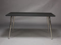 Skrivebord, sort højtrykslaminat, metal ben 130 x 70 cm. | HemmingsenInteriør